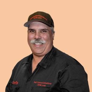 Photo of Charlie Roy - Owner of Pest Control Solutions NOW.com in company shirt and hat